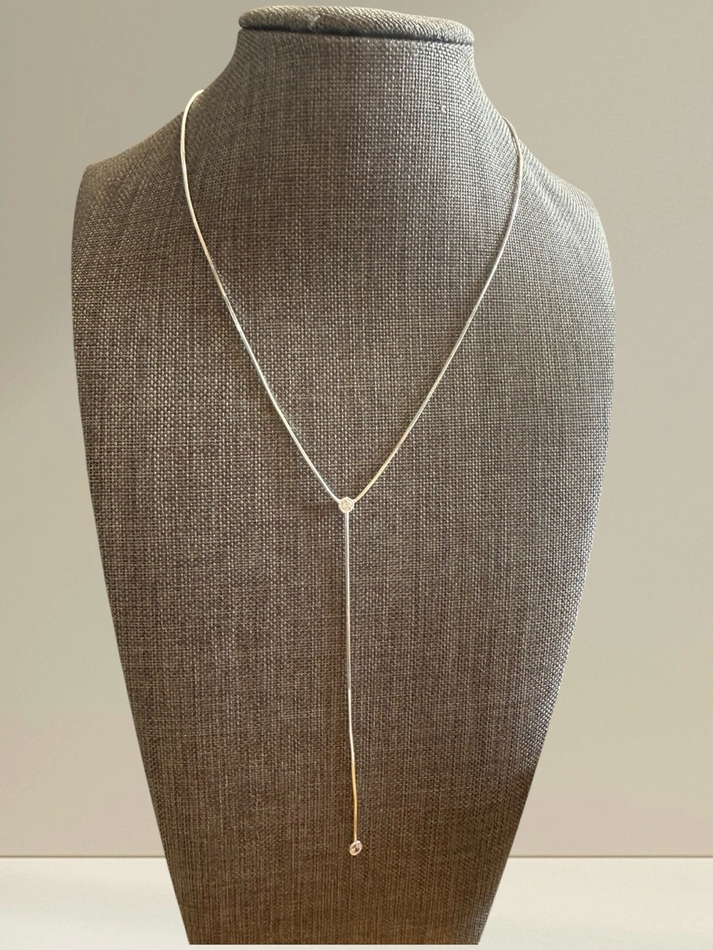 Elegant Silver Lariat Necklace with Droplet Accent